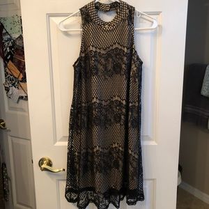 Cute mini dress with lacey mesh overlay